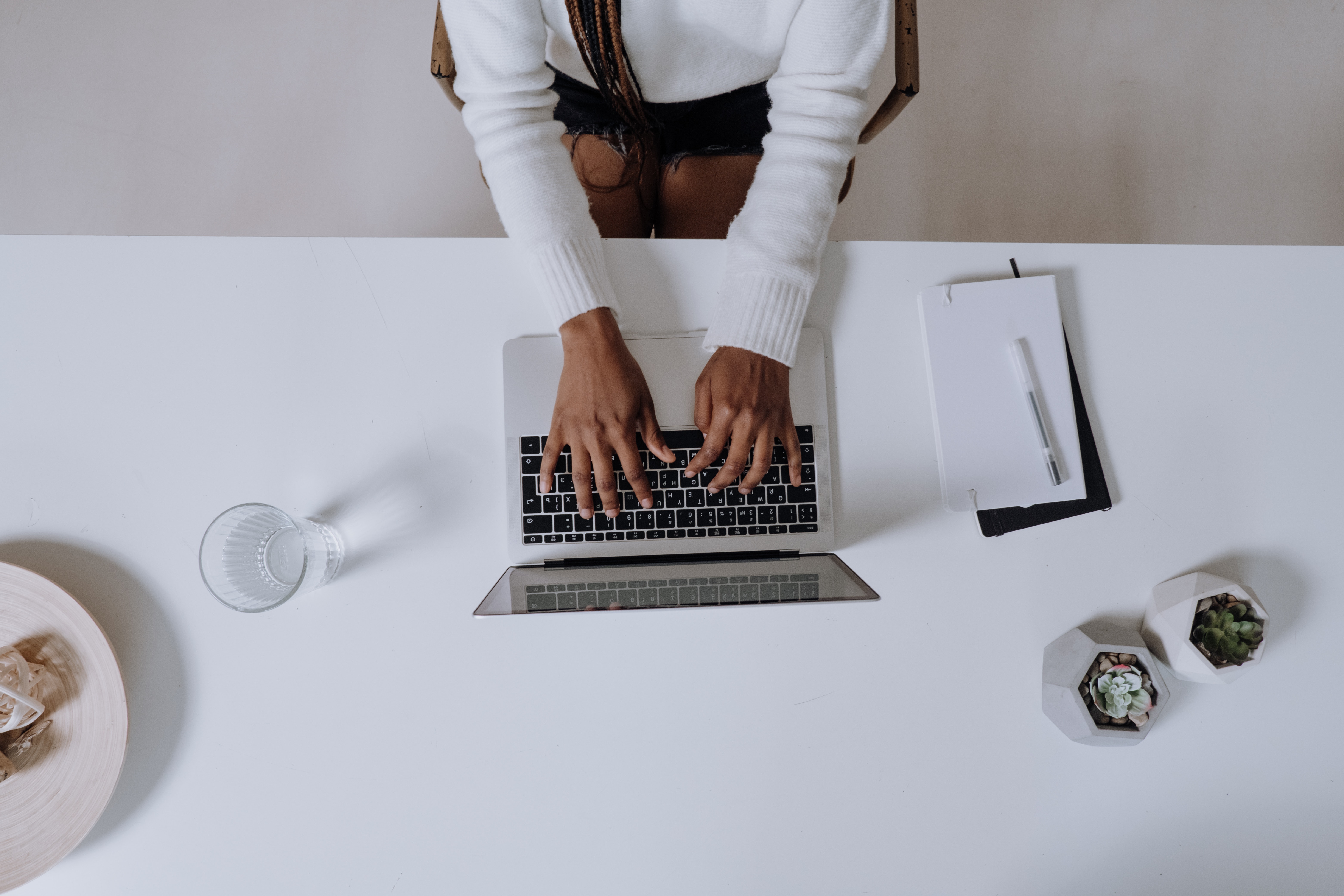 Image of woman sitting at a computer