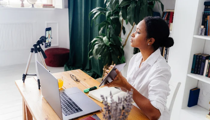 Image of a woman creating video content