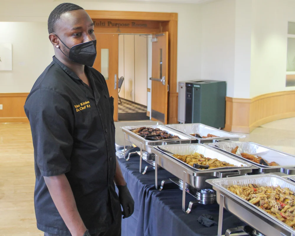 Chef Ky delivering Vybez at a catered wedding