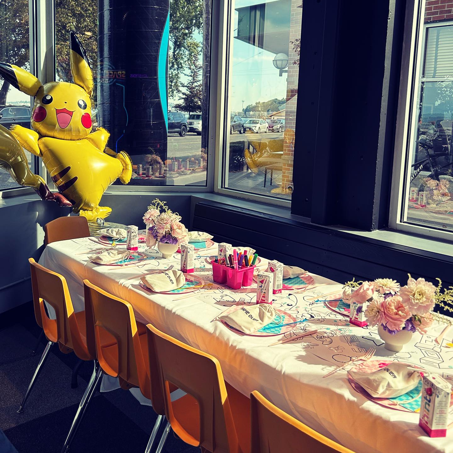 Party decor setup near windows