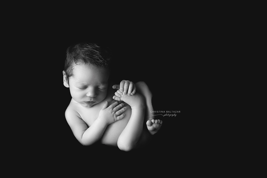 Newborn Boy in black & white image