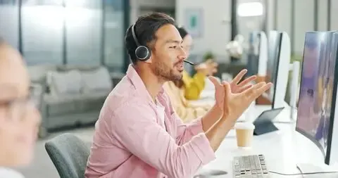 Professional in front of a screen taking a phone call for Wentworth Moving Services