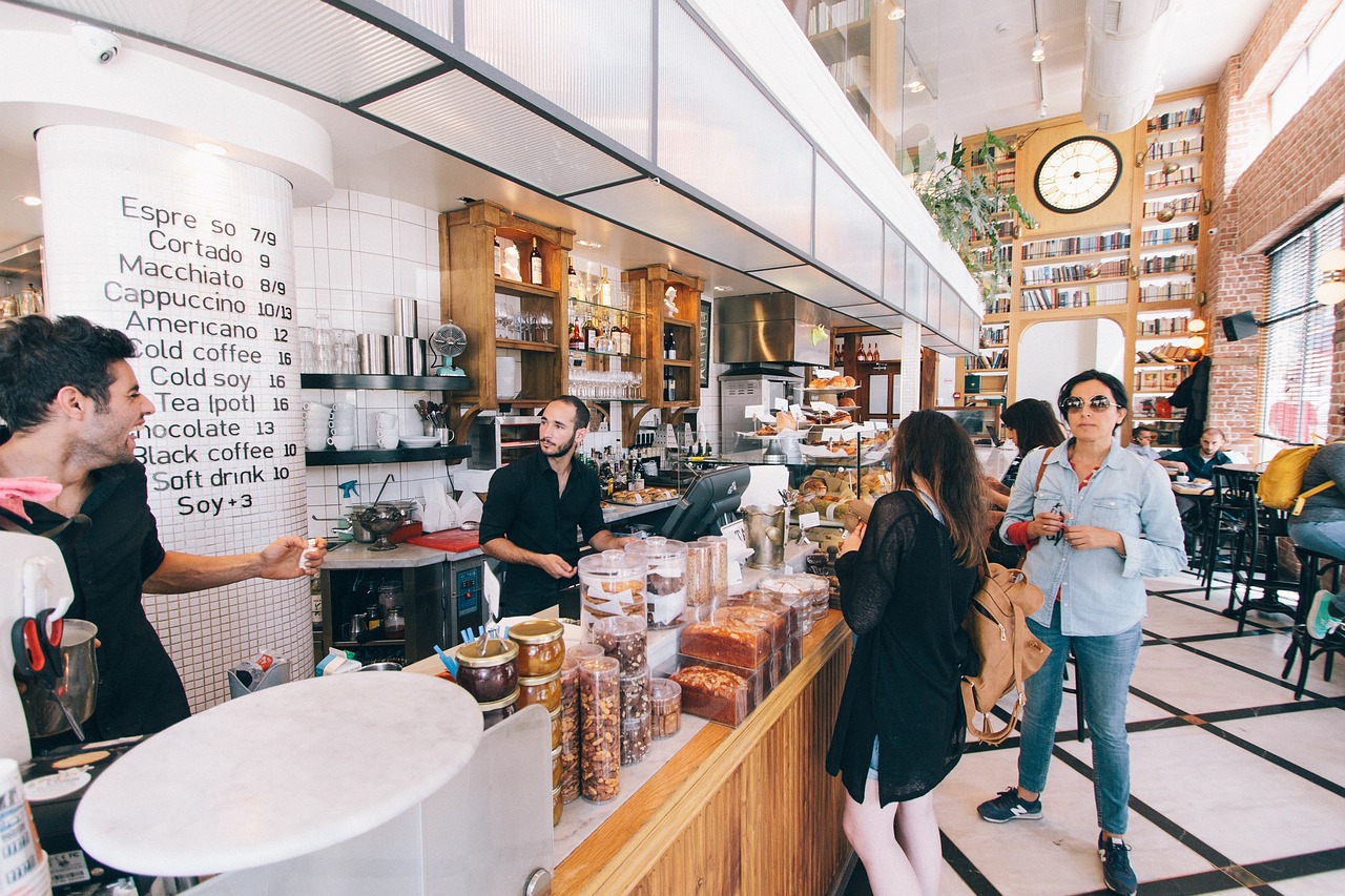 busy cafe with many people in line
