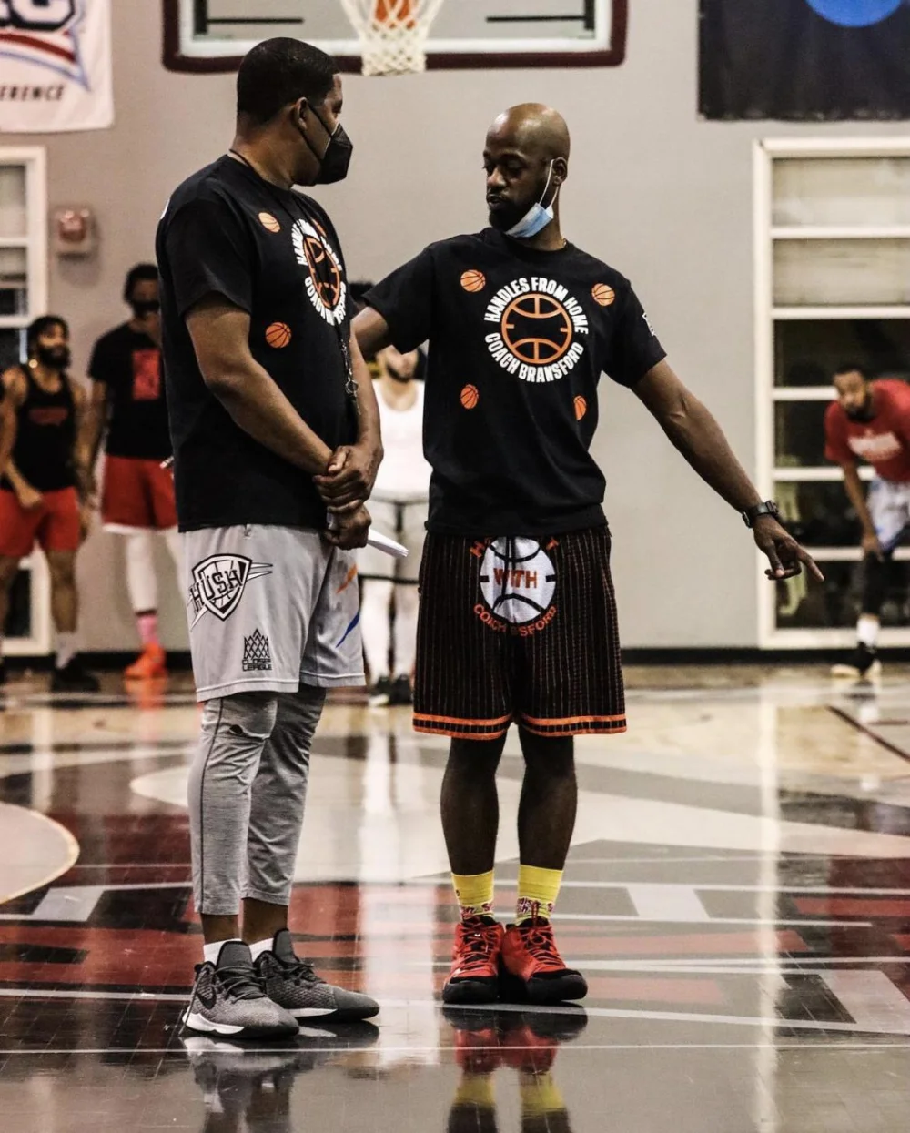 Coach Jalon Bransford (right)