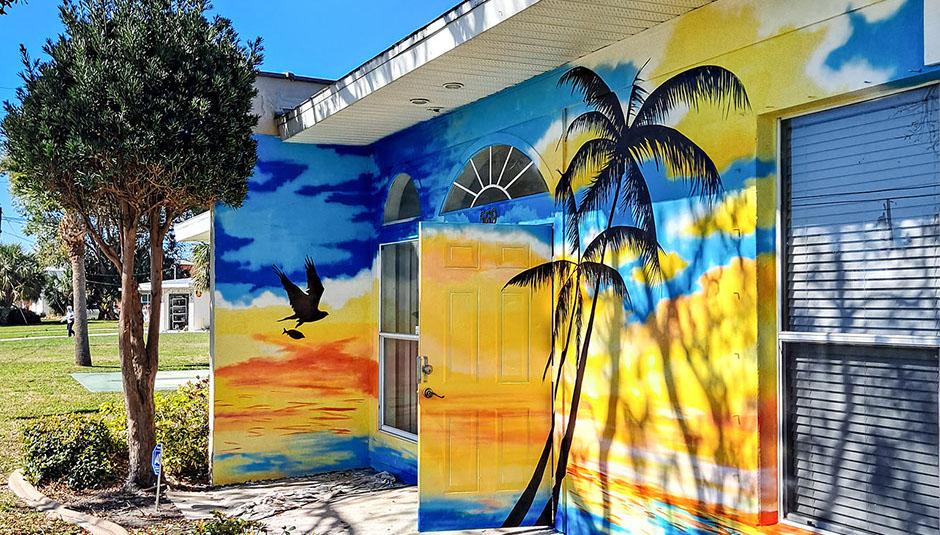 Sunset mural across the Baywood Clubhouse building