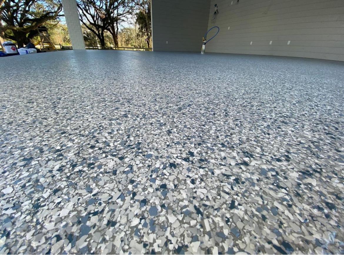 Durable commercial epoxy flooring installed in an Omaha warehouse or shop