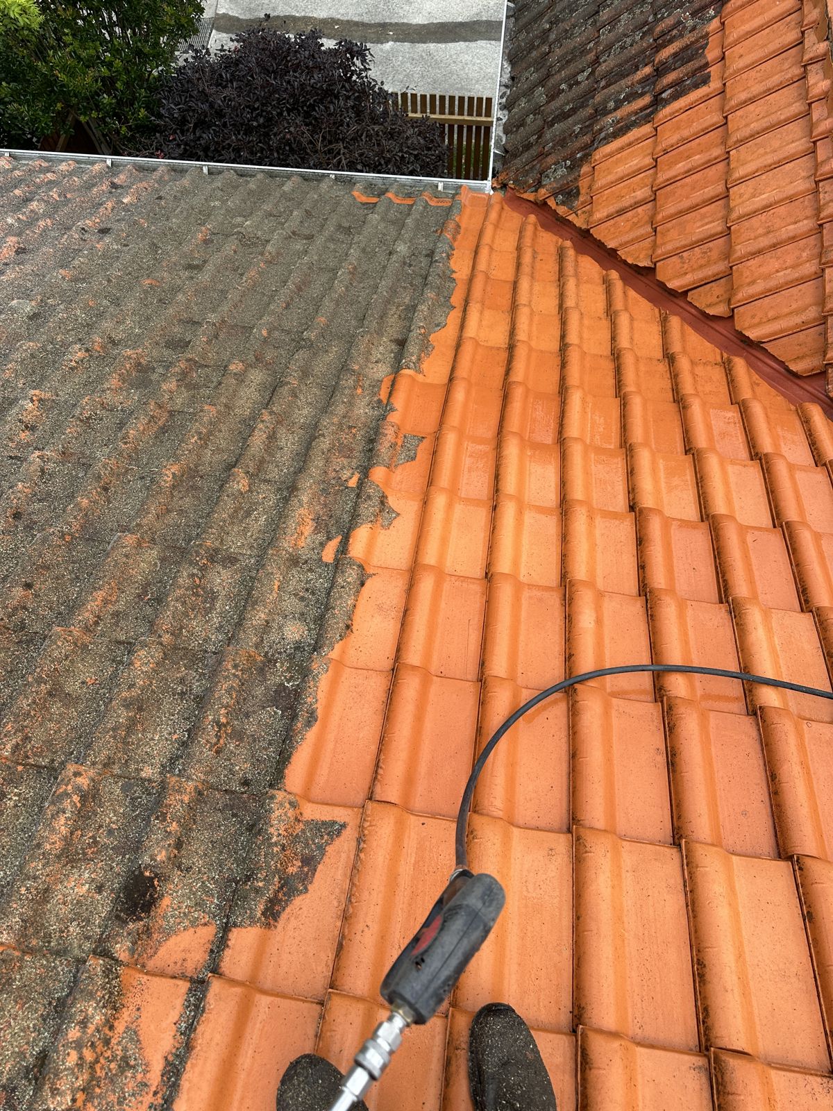 Professional house exterior pressure washing on a modern two-storey Australian home in Wollongong NSW by ClearView Exterior Services