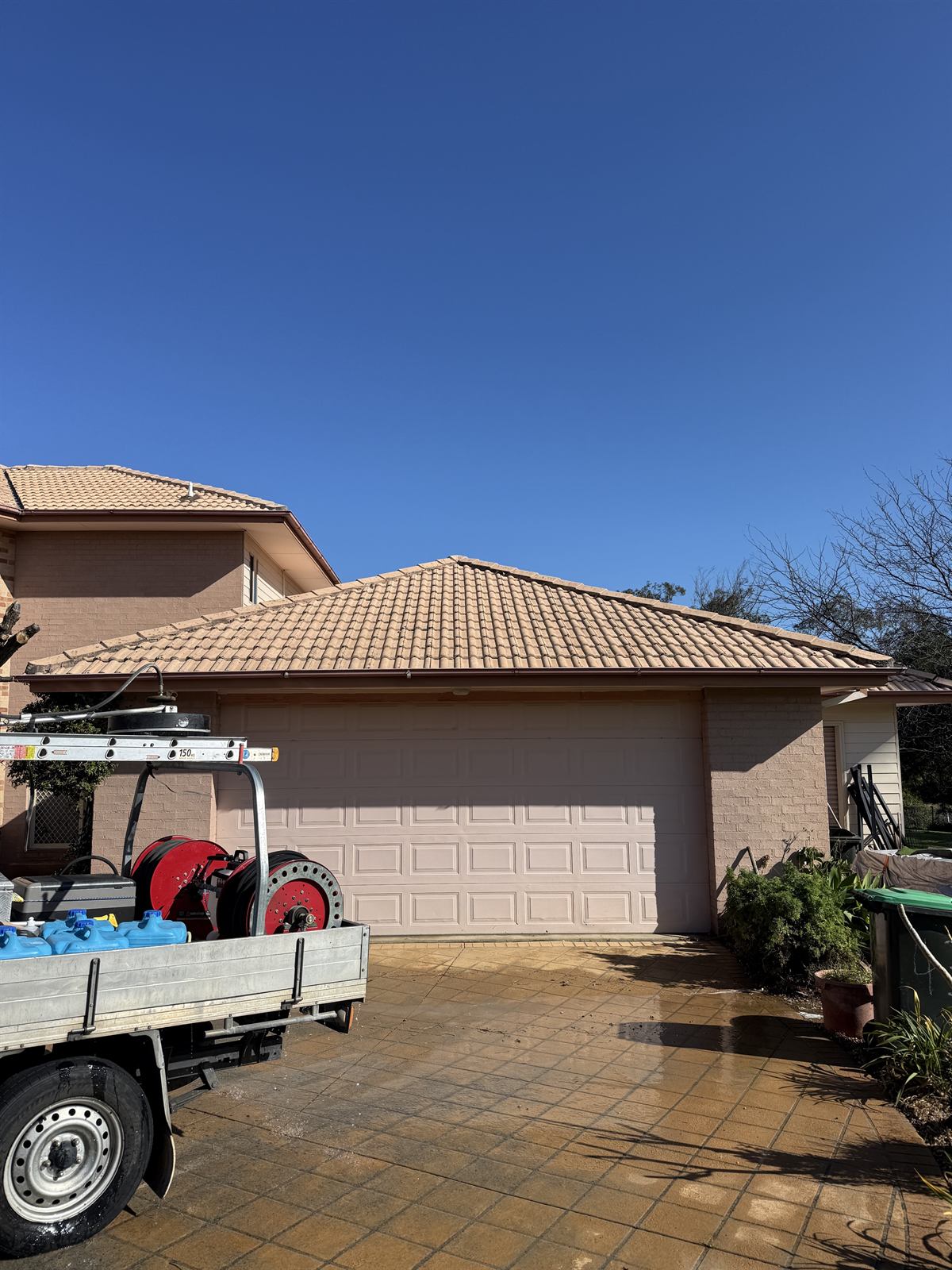 Tile roof after cleaning, front view, showing a visibly cleaner surface