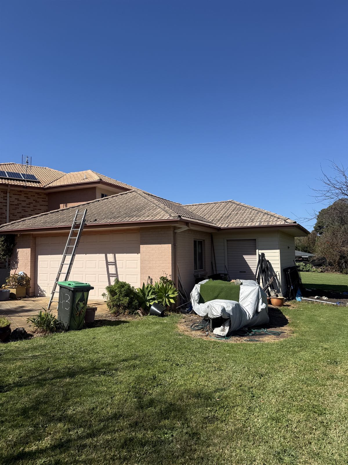Tile roof before cleaning, side view, showing visible dirt and discolouration