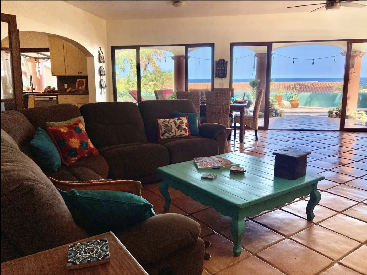 Living area at Casa Alba opening onto the ocean-view terrace