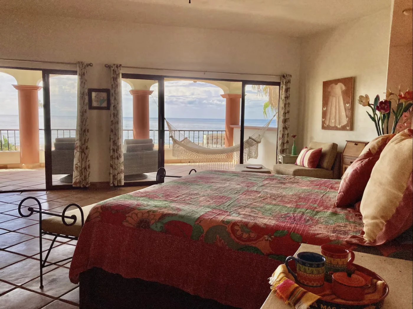 Bedroom at Casa Alba with sliding doors onto the ocean-view terrace