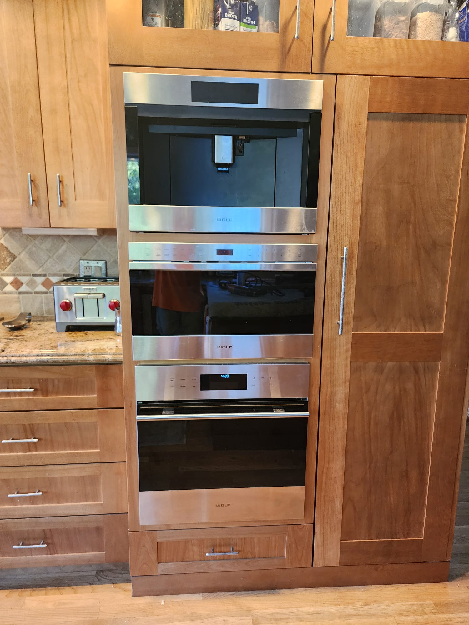 Custom cabinetry and built-in appliance installation by SMH Remodeling