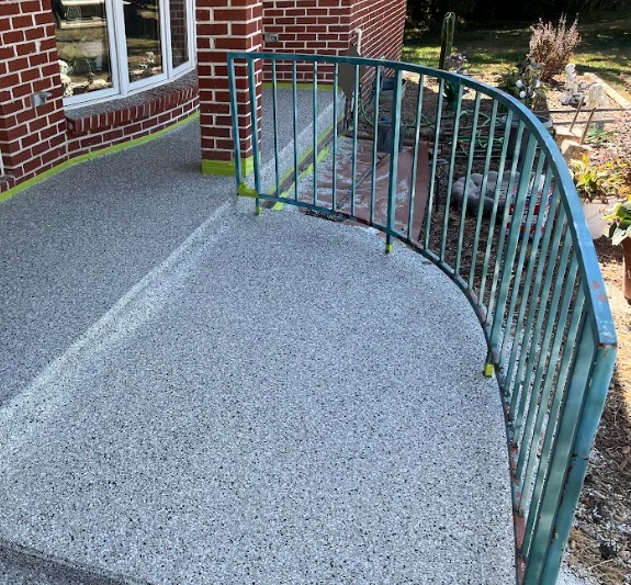 Professionally coated outdoor patio and driveway concrete in Omaha