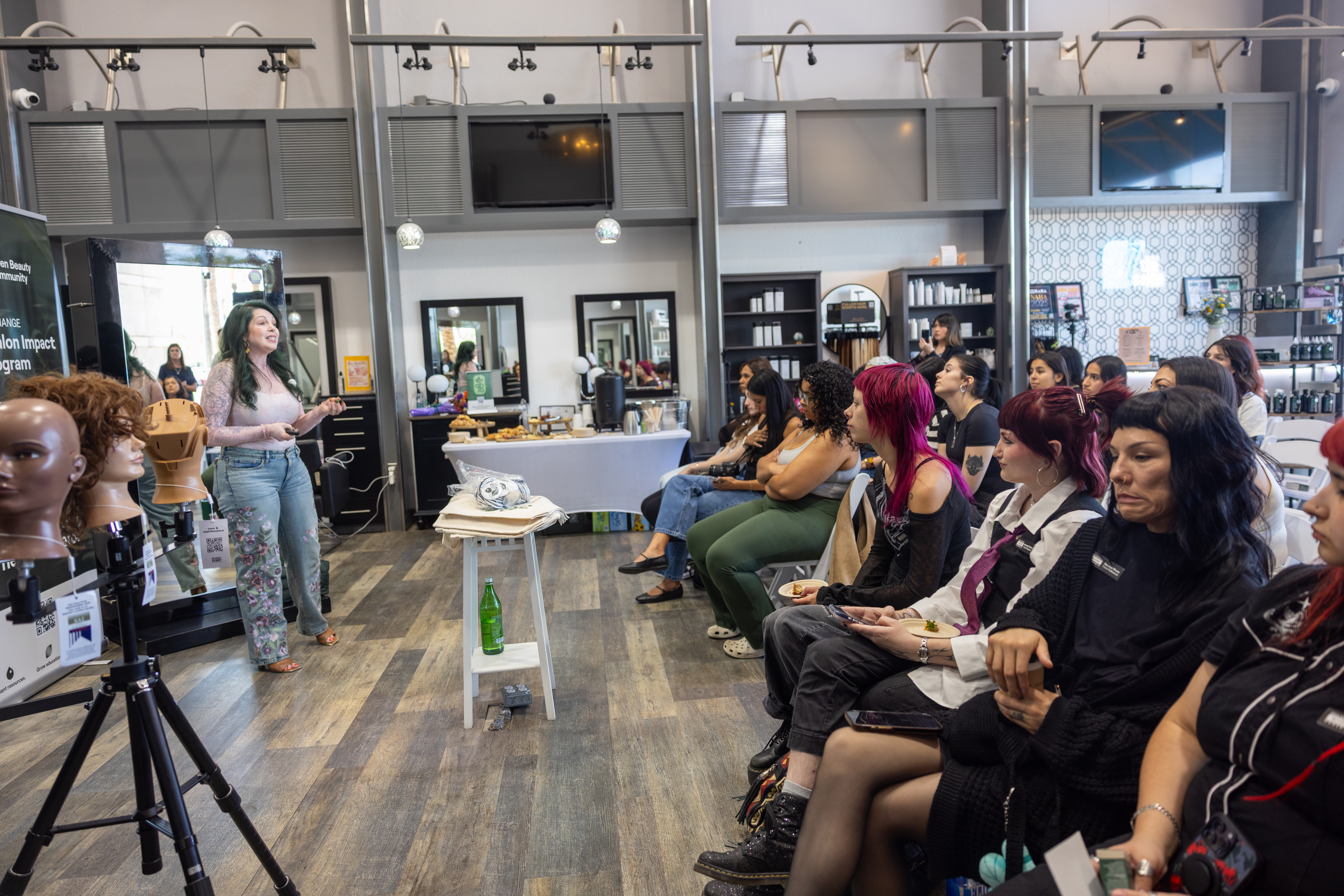 Jacquelyn Rodriguez teaching beauty professionals at The Green Salon Impact Tour
