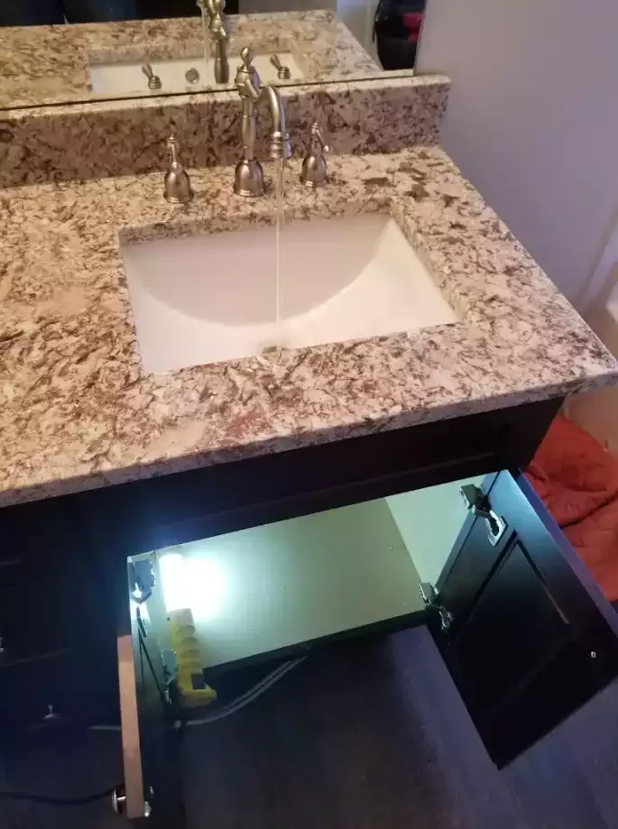 New bathroom vanity and faucet installed by Morris Plumbing