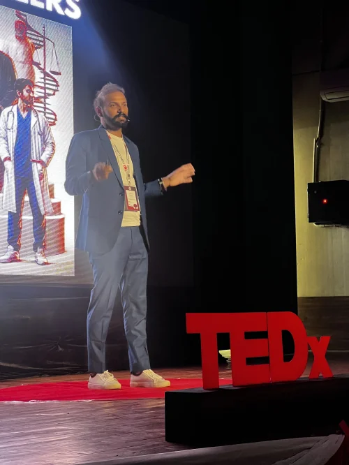 Nipun Syal delivering a TEDx talk