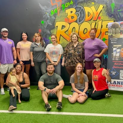 Members in front of the Body Roque mural