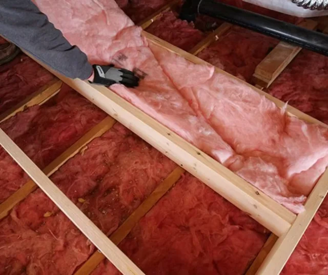 Fiberglass batt insulation between wall studs
