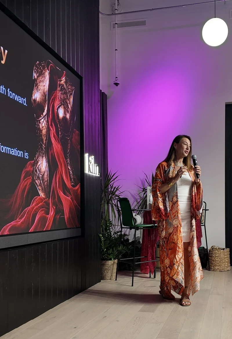 A Sparkle Party speaker presenting to the room