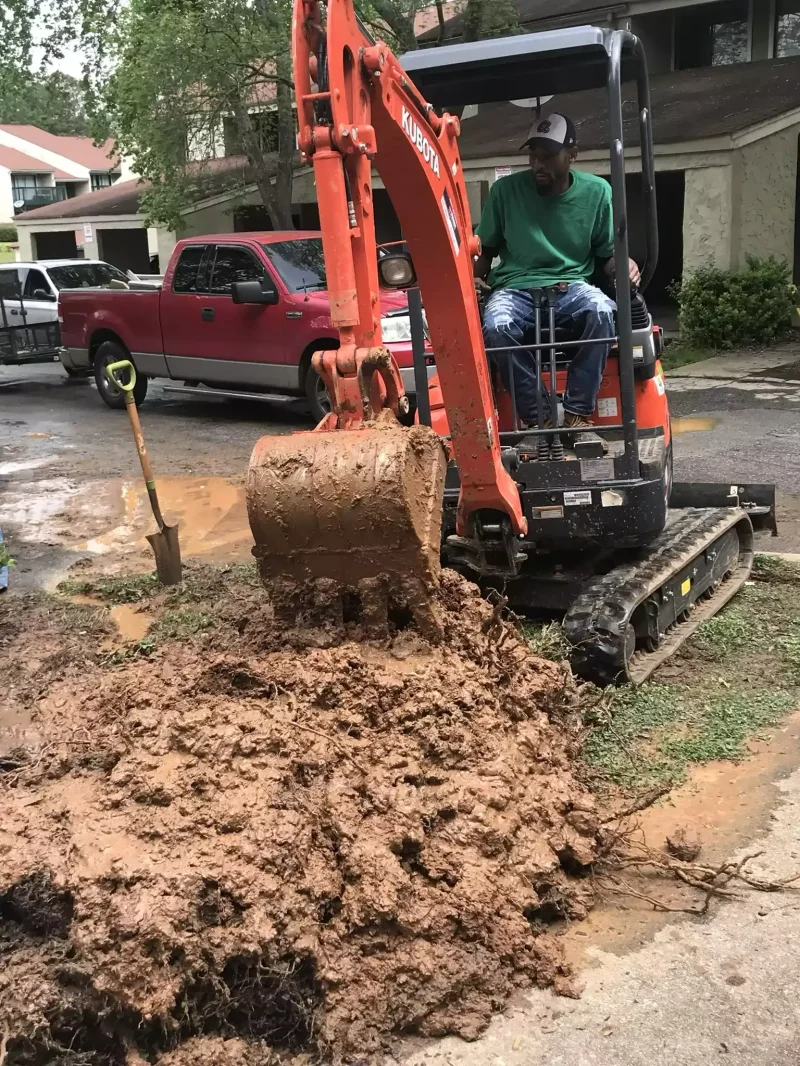 New drain pipes laid and sloped inside a trench