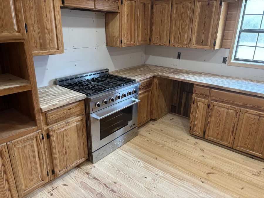 Finished kitchen remodel with custom cabinetry and granite countertops in Leesburg, GA