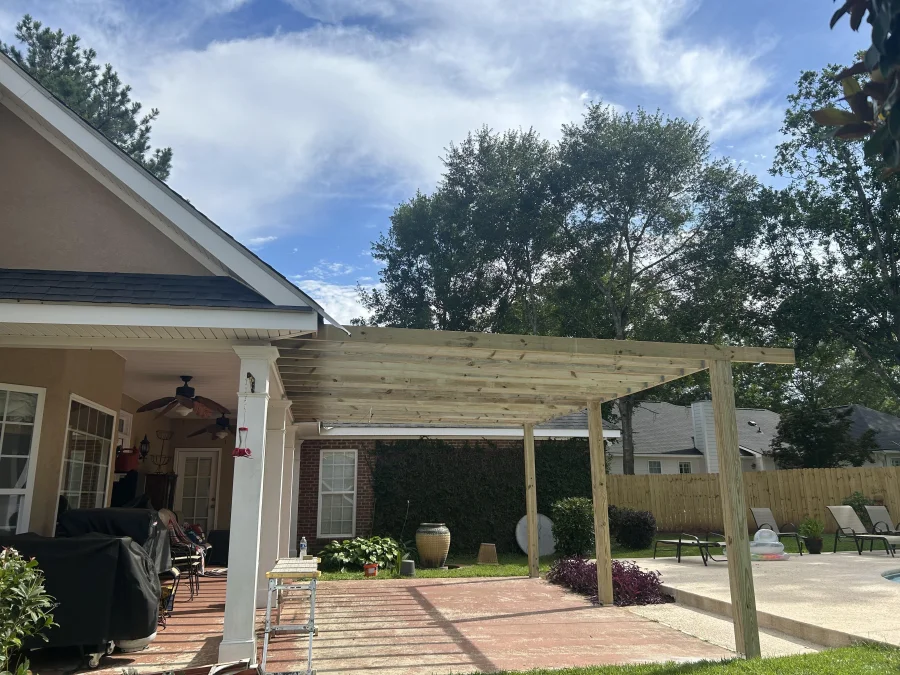 Patio cover framing tied into home roofline, Leesburg GA renovation