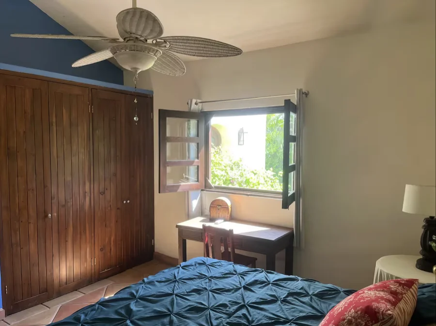 Bedroom at Casa Alba with a wardrobe and writing desk