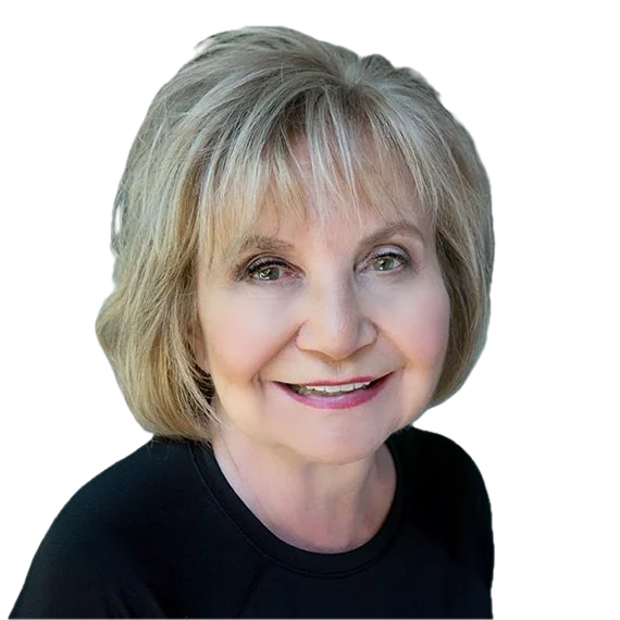 Portrait of Dr. Cloe Madanes smiling, in a black top