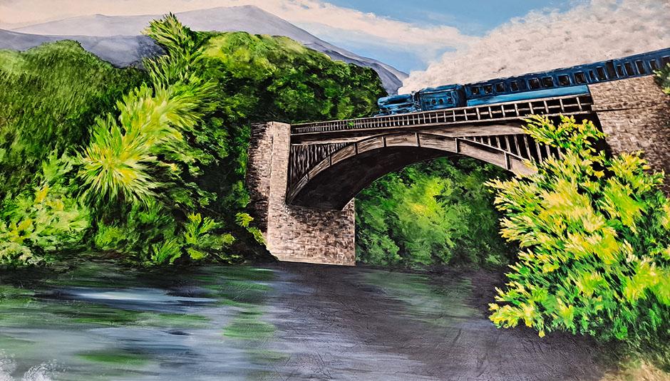 Hand-painted river and bridge mural at The Collection on Palmetto Museum