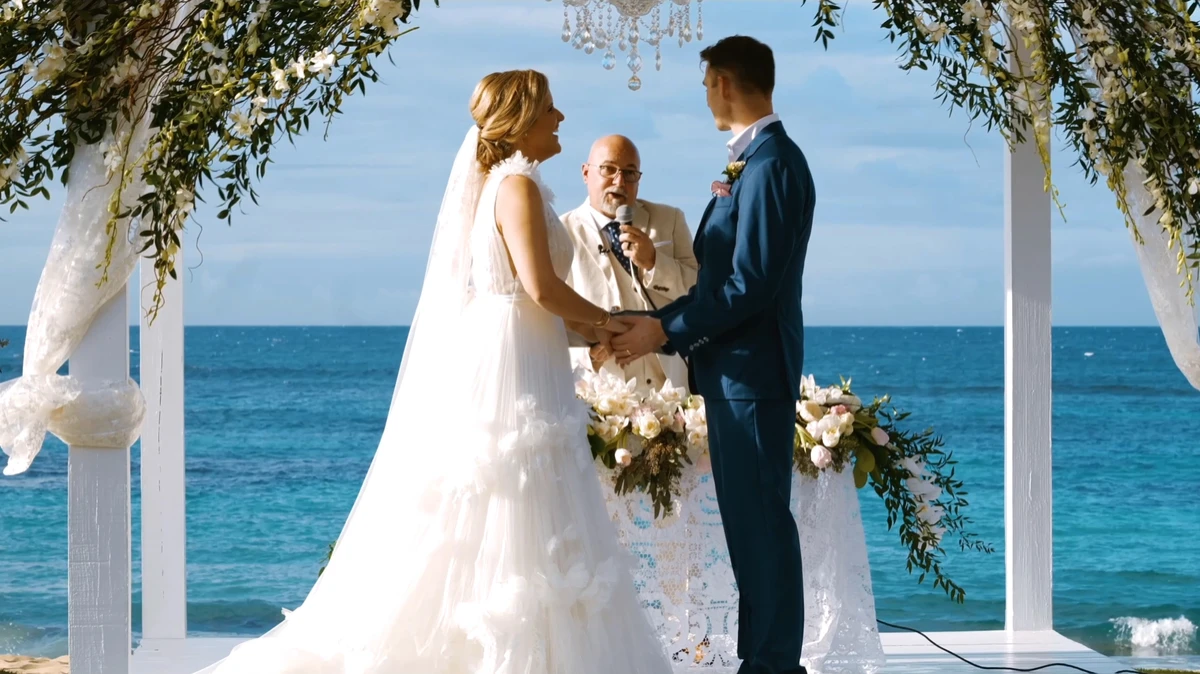 Natasha and Colton at their ceremony by the ocean in Puerto Rico