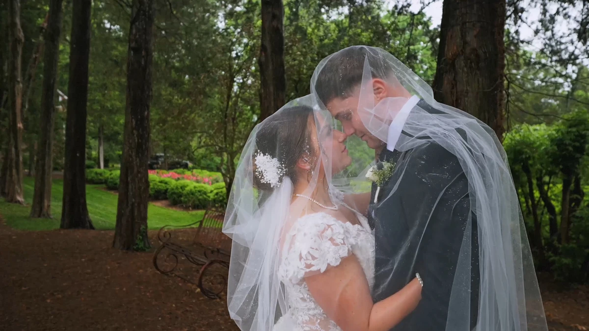 Ally and Callum under her veil in the woods