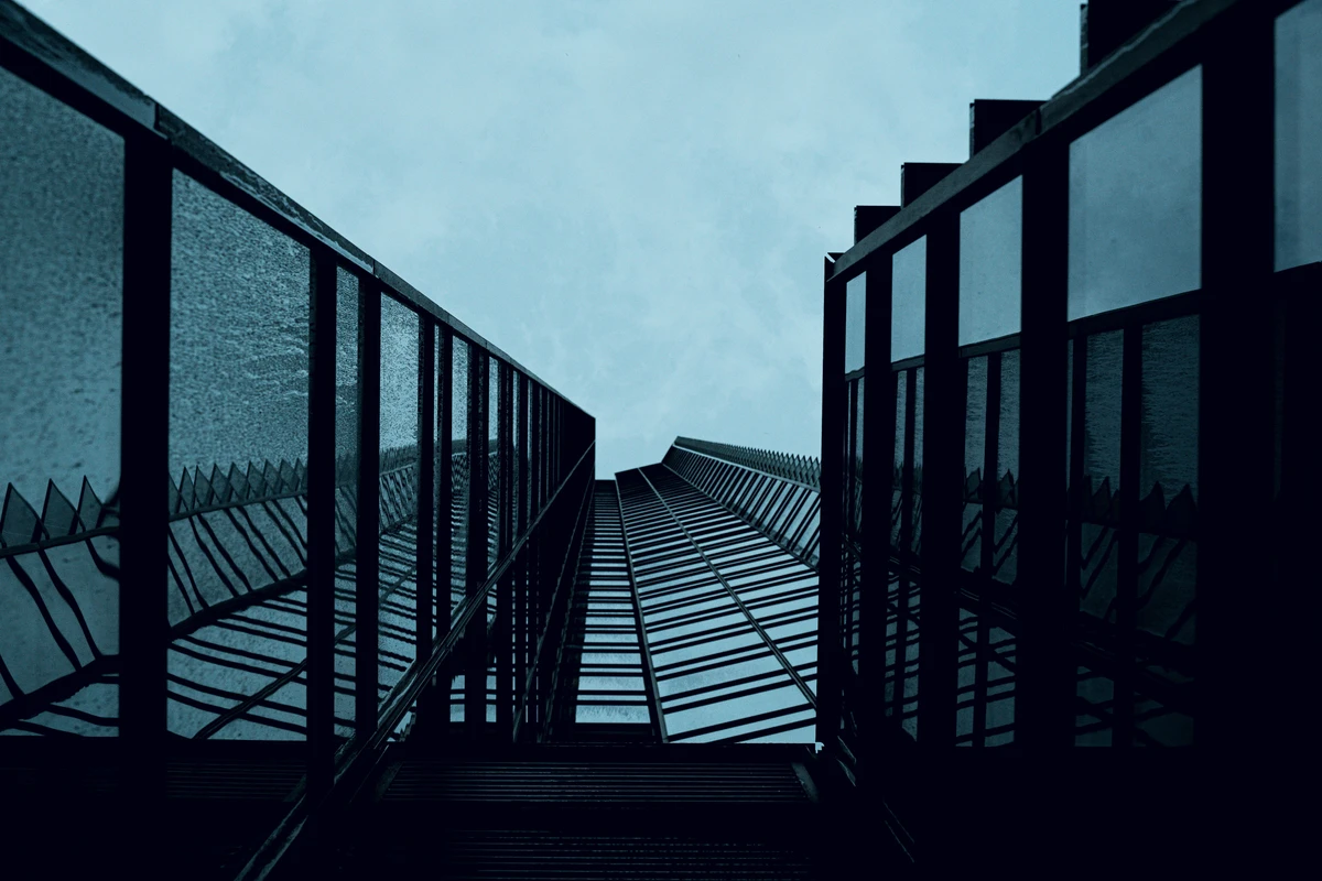Geometric architectural perspective representing coordinated digital infrastructure.
