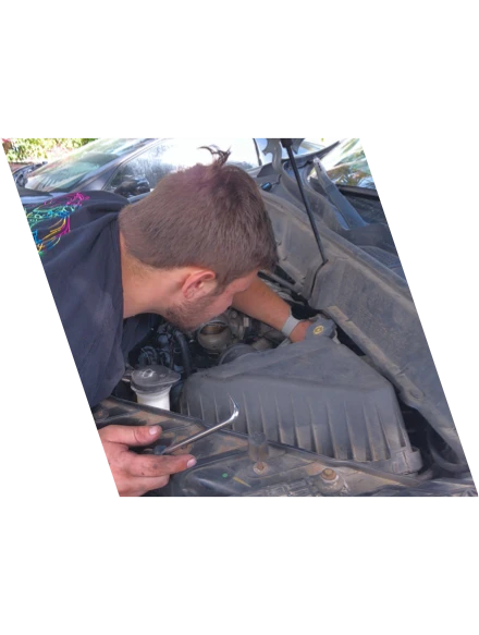 Hunter Hutton, owner of Jax Cruisers, working on a vehicle