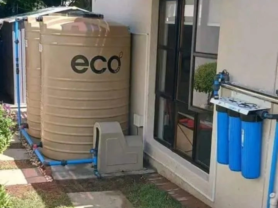 Installed backup water tank with filtration and plumbing